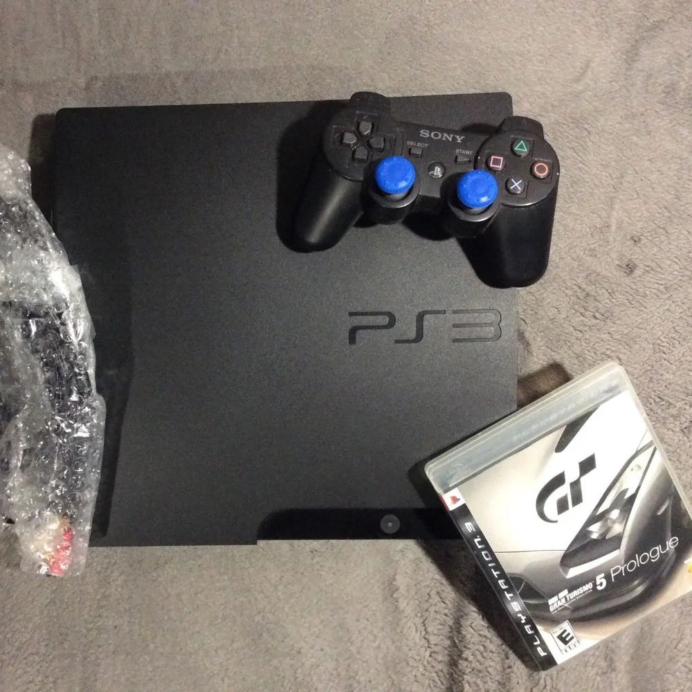 PS3 with Game - Picture 1 of 1